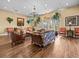 Relaxing community room with comfortable seating and hardwood floors at 220 Brunello Dr, Davenport, FL 33897