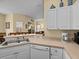 Kitchen boasts a double sink, dishwasher, and ample counter space at 220 Brunello Dr, Davenport, FL 33897