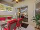 Covered patio with table and chairs, great for dining at 220 Brunello Dr, Davenport, FL 33897