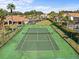 Well-maintained tennis court with surrounding fencing at 220 Brunello Dr, Davenport, FL 33897