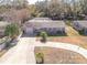 Aerial view of a single Gathering home with a fenced pool and large backyard at 2219 Pilaklakaha Ave, Auburndale, FL 33823