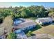 Single Gathering home with a screened in-ground pool in the backyard at 2219 Pilaklakaha Ave, Auburndale, FL 33823