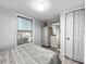 Simple bedroom with dresser and a window with natural light at 2219 Pilaklakaha Ave, Auburndale, FL 33823