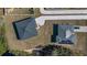Two homes with solar panels, viewed from above at 223 Elm Ct, Kissimmee, FL 34759