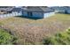 Spacious backyard with large grassy area at 223 Elm Ct, Kissimmee, FL 34759