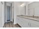 Modern bathroom boasts double sinks, granite counters, and a walk-in shower at 223 Elm Ct, Kissimmee, FL 34759