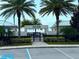 Twin Lakes community pool entrance with lush landscaping at 2438 Yellow Brick Rd, St Cloud, FL 34772