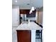 Modern kitchen with stainless steel appliances and granite countertops at 2438 Yellow Brick Rd, St Cloud, FL 34772