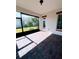 Bright screened patio with brick pavers and view of backyard at 2438 Yellow Brick Rd, St Cloud, FL 34772