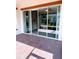 Screened patio with sliding glass doors leading to dining area at 2438 Yellow Brick Rd, St Cloud, FL 34772