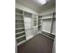 Large walk-in closet offering extensive storage solutions at 2438 Yellow Brick Rd, St Cloud, FL 34772