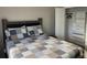 Comfortable bedroom with a bed, closet and carpet at 3034 Boating Blvd, Kissimmee, FL 34746