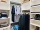 Organized walk-in closet with ample shelving and hanging space for clothes and shoes at 3034 Boating Blvd, Kissimmee, FL 34746