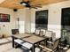 Covered patio with seating for dining and ceiling fan at 3034 Boating Blvd, Kissimmee, FL 34746