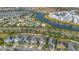 Community view showcasing a lake, pool, and homes at 3074 White Horse Ct, Kissimmee, FL 34746