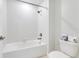 Clean bathroom with a bathtub, toilet and shower at 3074 White Horse Ct, Kissimmee, FL 34746