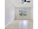 Bright bedroom with tile floors and ceiling fan at 3074 White Horse Ct, Kissimmee, FL 34746