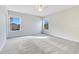Bright bedroom featuring neutral walls and plush carpeting at 3074 White Horse Ct, Kissimmee, FL 34746