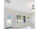 Dining room with tile floors and sliding glass doors leading to backyard at 3074 White Horse Ct, Kissimmee, FL 34746