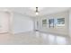 Bright dining room with tile floors and sliding glass doors at 3074 White Horse Ct, Kissimmee, FL 34746