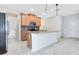 Modern kitchen with island, stainless steel appliances, and granite countertops at 3074 White Horse Ct, Kissimmee, FL 34746