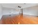 Spacious living room with hardwood floors at 3074 White Horse Ct, Kissimmee, FL 34746