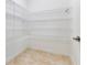 Walk-in pantry with wire shelving at 3074 White Horse Ct, Kissimmee, FL 34746
