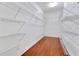 Large walk-in closet with wire shelving at 3074 White Horse Ct, Kissimmee, FL 34746