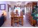 Elegant dining room with a large wooden table and hutch at 4626 Cumbrian Lakes Dr, Kissimmee, FL 34746