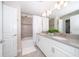 Spa-like bathroom with a double vanity, bathtub, and upgraded shower at 4816 Memories Ln, Kissimmee, FL 34746