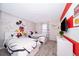 bedroom with twin beds and Mickey Mouse theme at 4816 Memories Ln, Kissimmee, FL 34746