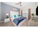 Main bedroom with king-size bed and plush carpet at 4816 Memories Ln, Kissimmee, FL 34746