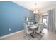 Bright dining area with a modern table and chairs, perfect for Gathering meals at 4816 Memories Ln, Kissimmee, FL 34746