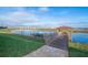 Wooden dock with kayaks and a covered seating area at 4816 Memories Ln, Kissimmee, FL 34746