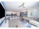 Open-concept living area showcasing a comfortable sectional sofa and large TV at 4816 Memories Ln, Kissimmee, FL 34746
