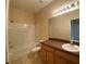 Bathroom with tub, shower, and vanity with a large mirror at 6660 S Goldenrod Rd # 126B, Orlando, FL 32822