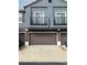 Two-car garage with brown doors and gray building exterior at 6660 S Goldenrod Rd # 126B, Orlando, FL 32822