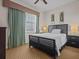 Spacious bedroom with a king-size bed and neutral decor at 7509 Mourning Dove Cir # 304, Reunion, FL 34747