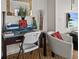 Functional home office with a desk and comfortable seating at 7509 Mourning Dove Cir # 304, Reunion, FL 34747