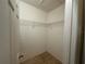 Large walk-in closet with wire shelving at 869 Colville Dr, Kissimmee, FL 34759