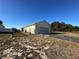 Detached garage with screen door at 869 Colville Dr, Kissimmee, FL 34759