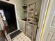 Bright laundry room with washer, dryer, and storage at 869 Colville Dr, Kissimmee, FL 34759