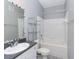 Bathroom with tub, toilet and vanity at 8848 Villa View # 106, Orlando, FL 32821