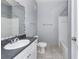 Clean bathroom, featuring a tub, toilet and vanity at 8848 Villa View # 106, Orlando, FL 32821