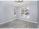 Bedroom with gray walls, tile floors, and a window with blinds at 8848 Villa View # 106, Orlando, FL 32821