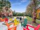 Community patio with colorful chairs at 8848 Villa View # 106, Orlando, FL 32821
