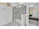 Modern bathroom with a large walk-in shower at 9194 Sommerset Hills Dr, Davenport, FL 33896
