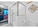 Bathroom with shower and view of bedroom at 9194 Sommerset Hills Dr, Davenport, FL 33896