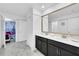 Well-appointed bathroom with double vanity and Frozen-themed decor at 9194 Sommerset Hills Dr, Davenport, FL 33896