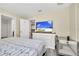 Cozy bedroom with a comfortable bed and plenty of storage at 9194 Sommerset Hills Dr, Davenport, FL 33896